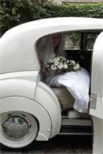 The wedding car arrives