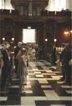 Entry to Chapel. Organist David Goode looking down from organ loft