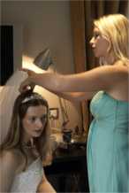 Bridesmaid Harriet MacKenzie fits the veil