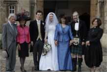 Bride and Groom with parents and chaplain, Rev. Alice Goodman