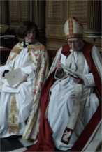 The Chaplain of Trinity College, Rev. Alice Goodman and The Right Rev. Dr. Peter Walker, former bishop of Ely